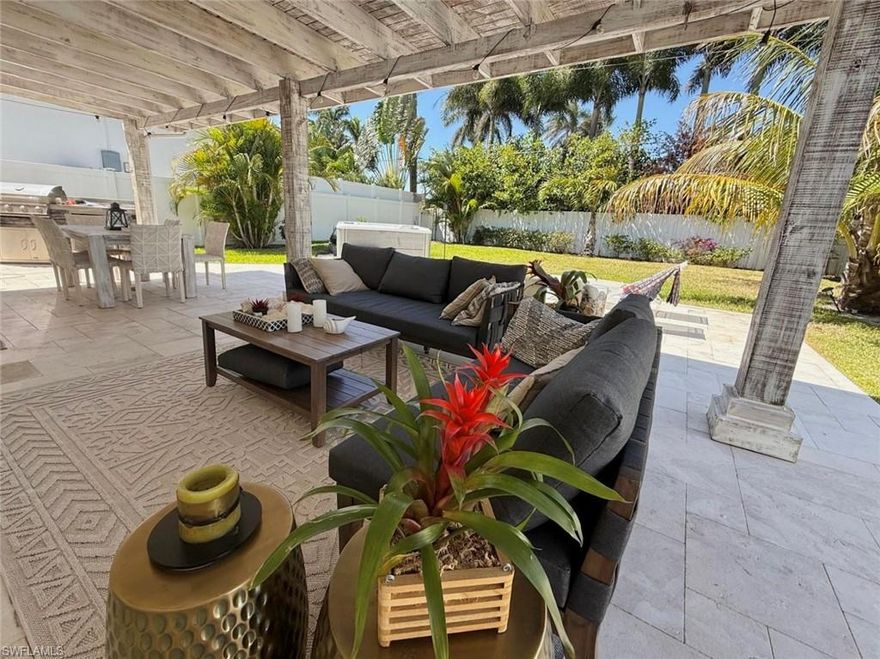 Welcome to Naples Park, a prime rental opportunity west of 41 with no HOA fees! This fully furnished turnkey home offers 3 bedrooms and 2 bathrooms, recently updated to provide modern comfort. The highlight of this residence is the renovated backyard retreat. Step outside to your private oasis featuring an outdoor kitchen, expansive patio, and a jacuzzi. You can relax and entertain in the Florida sunshine, surrounded by a serene and inviting atmosphere and beautiful landscaping. This stunning property offers the perfect blend of location and comfort. The prime rental location puts you at the southernmost end of Naples Park. You'll be in the heart of everything, with Mercato's shopping and entertainment just a short distance away. Vanderbilt Beach, Ritz Carlton Beach Resort, and Delnor-Wiggins State Park are easily accessible. Waterside Shops and downtown areas are within reach. Don't miss your chance to experience a piece of paradise!