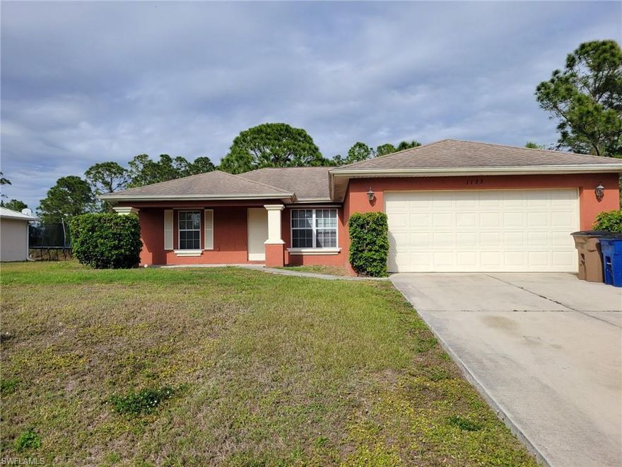 Spacious 3 bedroom 2 bath home with a screened in back patio and large back yard. Open floor plan, and close access to SR-82.