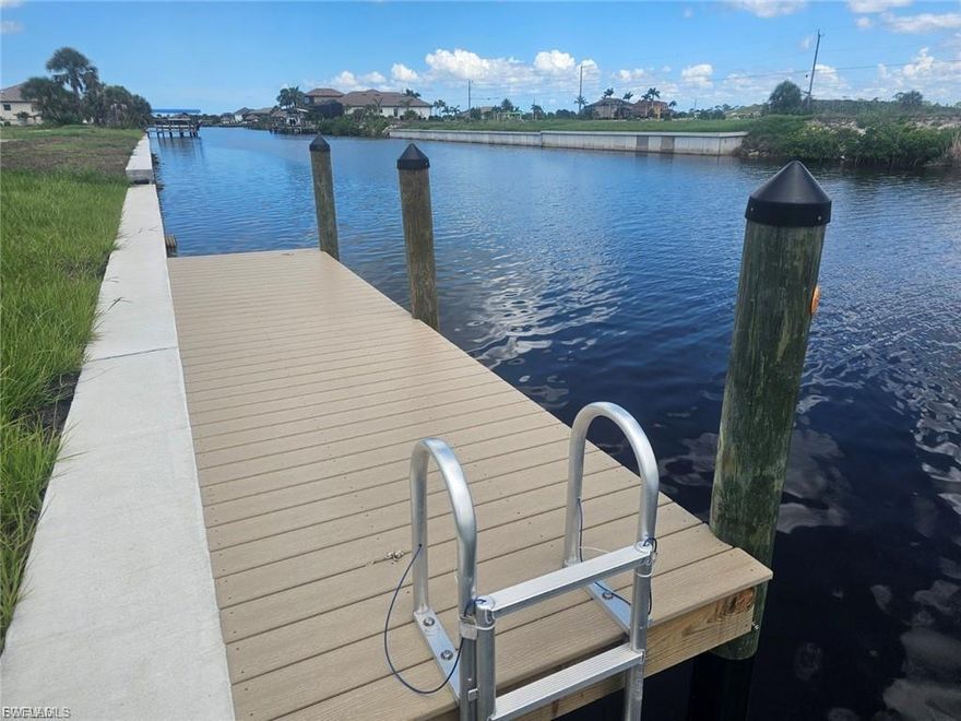 Direct Gulf Access Waterfront Lot – Your Gateway to Paradise! Imagine waking up to shimmering water views and launching your boat from your private dock—this stunning Gulf-access homesite is ready for your dream build, complete with a brand-new seawall and dock already in place. Located in one of Cape Coral’s most exciting growth corridors, you’re just moments from the all-new Crystal Lake Park, featuring boat ramps, kayak launches, a fitness park, and breathtaking sunset vistas from the overlook hill. Boater’s Bliss & Angler’s Paradise With world-class fishing and endless boating adventures right outside your door, this location offers direct access to the Gulf of Mexico and nearby islands. Whether you're cruising to waterfront restaurants or exploring hidden beaches, the lifestyle here is second to none. Surrounded by Southwest Florida’s Best Enjoy quick access to shopping, dining, resorts, airports, and the region’s most beautiful beaches. Cape Coral boasts more canals than any city on Earth and is the largest city in SWFL—making it a top destination for tropical living and smart investing. Ready to Build with Top Local Builders New construction is booming in the area, and you’ll have your pick of trusted builders to bring your vision to life. Whether you're designing a luxury retreat or a cozy coastal cottage, this lot is your blank canvas. Fall in Love. Make the Move. Live the Dream. This isn’t just land—it’s a lifestyle. Come experience the magic of waterfront living in Cape Coral and claim your piece of paradise today.