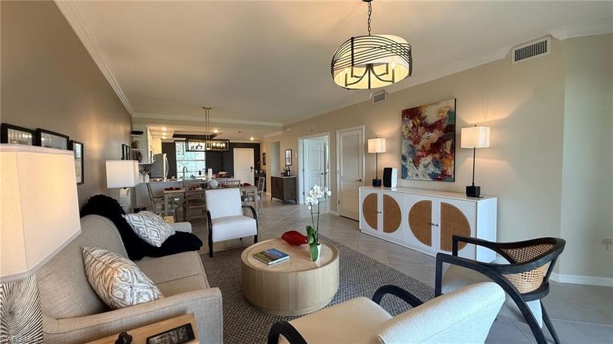 PROFESSIONAL PICTURES COMING SOON! 
Opportunities like this don’t come along often—and this one comes with a full bundled golf membership to the prestigious Gordon Lewis–designed championship course, making it a dream for any golf enthusiast! This stunning, fully furnished 2-bedroom + den, 2-bath residence features the largest Veranda floor plan, offering 1,569 square feet of spacious, beautifully designed living. Perfectly positioned to capture incredible views, this east-facing, end unit condo overlooks the sparkling lake and the first hole of the championship golf course—treating you to breathtaking sunrises each morning from your lanai, coffee never tasted so good!

This highly sought-after Arabella floor plan features impressive upgrades throughout, including custom paint and thoughtfully designed closet systems with built-in wood shelving and drawers in every closet for optimal organization. The kitchen has been beautifully enhanced as well—all kitchen cabinets, including the pantry, feature convenient pull-out drawers for maximum functionality, and pull-out drawers have also been added in the master bathroom. The home also includes brand-new upgraded appliances, including the washer, dryer, dishwasher, and refrigerator. Crown molding has been added to literally every part of this gorgeous home, including the bathrooms, hallways, and even the laundry room—creating a polished and elevated look throughout the entire residence. For added convenience and storage, the home also includes a one-car garage.

With its unbeatable views, extensive upgrades, desirable floor plan, bundled golf, and beautiful furnishings, this home is an exceptional opportunity and an incredible value. If you’ve been waiting for the perfect Veranda unit, this is it—one of the most beautiful and well-appointed units currently available.

Ave Maria ~ Once you get here, you “get it.”