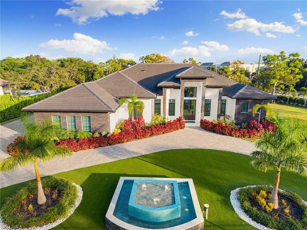 Photo of 10 Caribbean RD, NAPLES, FL 34108 (MLS # 226019813)