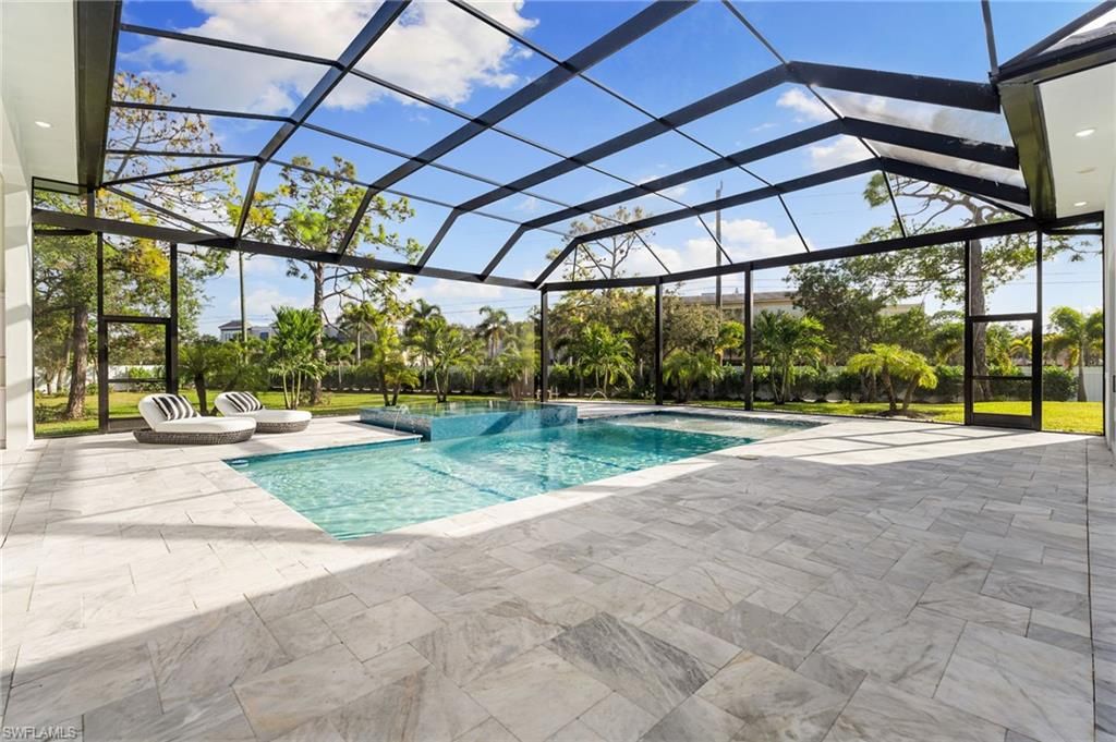 Photo of 10 Caribbean RD, NAPLES, FL 34108 (MLS # 226019813)