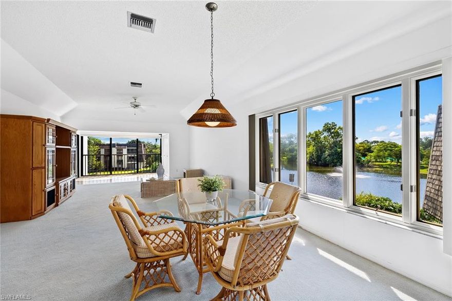 Tropical views abound from the many windows of this corner-unit, top-floor condominium. This original-condition home is only steps from the pool and lives bright and open. Conveniently located near parking in an elevator building, this condominium offers a vaulted ceiling in the large living/dining area, an outdoor storage closet, a walk-in closet and in-unit laundry. The AC was replaced in 2018. Views of the pool and sunsets are seen from the kitchen and front porch, and the back sliders offer gorgeous sunrise views. Naples Bath and Tennis is conveniently located within walking distance to shopping and dining and is only a few miles from the Gulf of Mexico. No rentals until three years of ownership.
