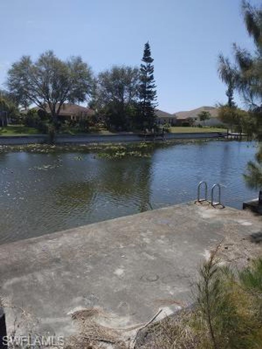 Beautiful Freshwater Lot with a SEAWALL and DOCK located in SW Cape Coral. Waterfront view facing SW to enjoy the sunsets. This lot is ready to build your Dream home on! Nice neighborhood in a central location close to shopping and schools. Property on City Water & Sewer.