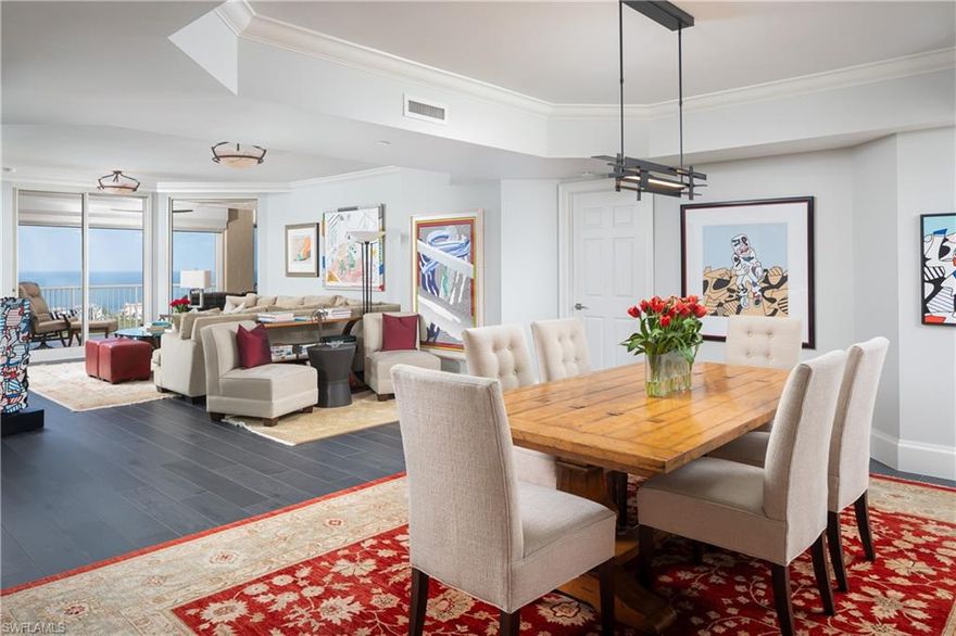 Introducing a stunning 3-bedroom, 3-bath luxury tower residence which has undergone a total renovation with high-end appliances, fixtures, and backgrounds, and amazing finishing details. From this extraordinary 18th floor end unit with 9' ceilings and wonderful natural light, there are spectacular wrap-around views east, west, and north.  #1809 has the unique feature of the sunrise terrace. The balcony on the west has a retractable screen and electric hurricane shutters. (Sunrise on the golf course, magnificent sunsets on the Gulf of Mexico, and a lanai with unobstructed views all the way to Captiva.) Two parking spaces & a deeded storage locker are included.   St Raphael has incredible amenities (largest pool in Pelican Bay, Har-Tru tennis courts, health club/fitness center) and prime location just steps from the boardwalk to the north beach club and Marker 36 (1 of 2 private beach clubs with over two miles of beach for the exclusive use of Pelican Bay residents). St Raphael has impact resistant glass on all windows and sliders. (2 small pets allowed.) Enjoy the convenience and security of the luxury tower lifestyle in the ultimate beach resort community in Southwest Florida.