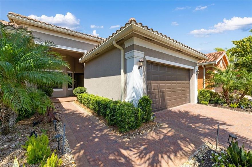 LOCATION LOCATION LOCATION WILL NOT LAST LONG! This villa has it all and comes with  numerous designer upgrades and high-end appointments to include, designer lighting  & fans, stone kitchen backsplash, closet built-ins, custom kitchen, upgraded stainless appliances, a triple paneled  hurricane slider overlooking  an expansive paver patio & lake view, an electric hurricane shutters off the screened in lanai, and  if I could not get any better  this home has  upgraded travertine flooring.  The exterior  landscaping and  lighting has been upgraded and meticulously maintained.  Marbella Isles is a gated community and has a resort style  amenity center to include a community pool, fitness room, tennis, indoor outdoor basketball and a kids playing area.