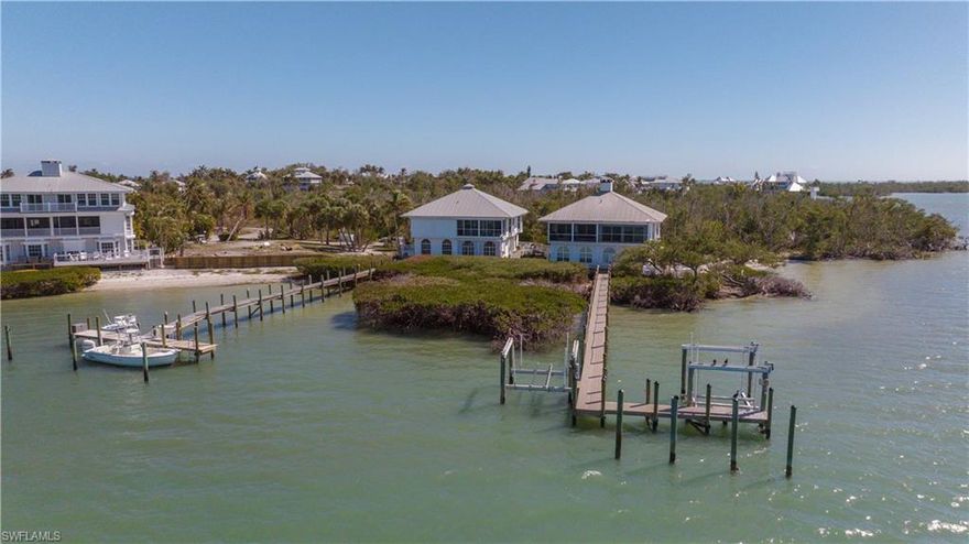 Get away from it all at your idyllic waterfront retreat. Nestled on the serene southwestern shoreline of Whoopee Bay located on the private island of Useppa, this charming property delivers breathtaking sunset views from the balcony, living room and master bedroom with convenient direct waterfront access to the the Intracoastal Waterway and Cabbage Key, Cayo Costa, Boca Grande Pass and beyond. The home offers a perfect blend of functionality and comfort, featuring two primary suites on the main level. Upstairs, the bright and light living and dining space is accented by warm hardwood flooring, vaulted ceilings, a functional fireplace perfect for cozy evenings, and newly updated impact sliders and windows accentuating the sweeping views of the bay and intracoastal. The screened porch is the perfect place to unwind, opening up to the gorgeous views and gentle gulf breezes. The fully equipped kitchen features granite countertops, as well as ample space for all your needs. Additionally, upstairs there are also double doors leading to a den, currently outfitted with bunk beds, which is a perfect space for accommodating additional guests or children. Recent updates include all windows and sliders replaced with PGT hurricane impact systems in 2023 as well as brand new HVAC system in 2025. Directly out front of the property is a protected area with a private shared dock, one/third ownership, providing dedicated use of a boat slip which is a tremendous amenity on the island and enables free and easy access to the pristine waterways. The location is truly ideal, with an under 5 minute boat ride to iconic Cabbage Key, and just a 15 minute ride to Boca Grande for dining, shopping and world class Tarpon fishing. Also, included is a transferable boat lift at nearby Safe Harbor Pineland Marina, perfect for quick assess to Useppa as your personal shore port. The Useppa Island Club & Marina is undergoing a transformative modernization and restoration project of the infrasturcture and shared areas, led by the new homeowner-led ownership group. First class amenities include the marina, historic Collier Inn, beaches, paths, landscaping and more—positioning Useppa as an even more exclusive, resilient and elevated paradise in the years ahead. Ownership on Useppa Island does require a resident membership with the Useppa Island Club & Marina and buyers should verify and complete all due diligence as to the club's operations and fees etc.. Whether you’re seeking a peaceful family escape, a fisherman’s haven, or a savvy investment in one of Florida’s most exclusive private islands amid major upgrades, this Bay Harbor Bungalow delivers unparalleled tranquility, convenience, and unprecedented Old Florida charm. Embrace the revitalized Useppa lifestyle—contact us today to schedule a viewing!