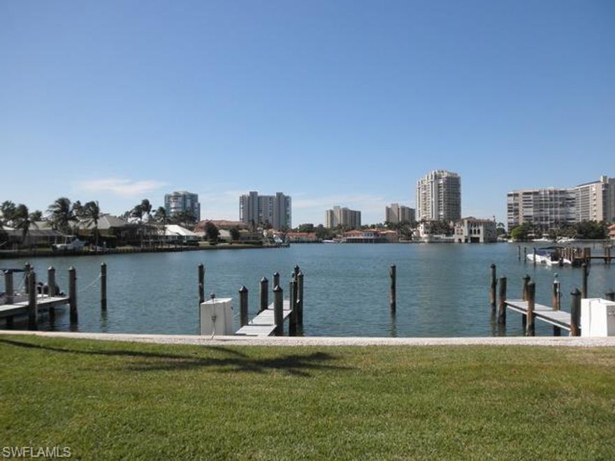 Enjoy spectacular bay views and panoramic views of Venetian Village in the heart of Park Shore.  This exquisite Park Shore residence has been completely renovated with over $ 200,000 in upgrades at builder cost. The home was stripped down to concrete & studs for this overhaul. Not like any other residence in Colony Gardens. Addition of upstairs laundry room, added steel support, enclosed lanai, all new kitchen & bath, all new electrical and plumbing.  3 bedroom townhome with a bedroom on the first floor. In addition the owner has paid off the $ 60,000 assessment to Colony Gardens for all their improvements including parking lot pavers, all new windows, new roof, exterior paint and upgraded community pool. The location and views can't be beat.