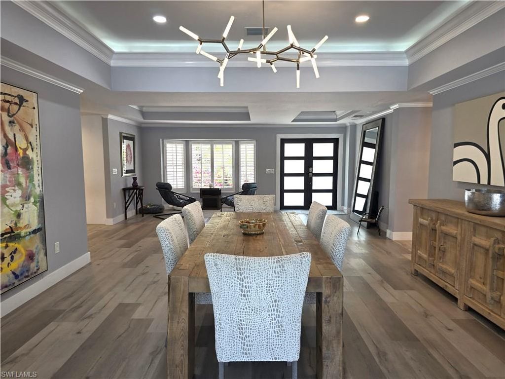 Photo of 557 Parkwood LN, NAPLES, FL 34103 (MLS # 226015437)