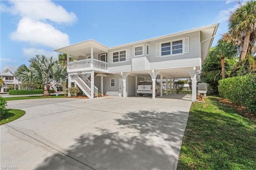 Here is carefree, trouble-free living at its best.  This beautiful stilt home in Bokeelia’s Captains Cove has had about all the systems replaced or updated recently, including a new metal roof in 2020, new composite dock and 10,000# lift with canopy, all new appliances, new pool heater and pump, upgraded electrical systems, new AC’s and ductwork and more.  There’s even an elevator!  Inside are three large bedrooms, 2 baths, and a large great-room with what is probably the largest kitchen on the island.  Mostly furnished, you can move right in worry-free and start enjoying the island lifestyle.  You can catch snook and tarpon from your dock, or boat to the nearby beaches of Cayo Costa or visit island restaurants like Cabbage Key.  Cheeseburger in Paradise, anyone?