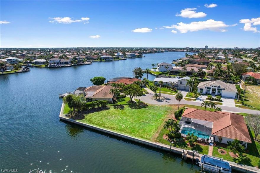 Embark on your own journey to paradise with this idyllic slice of Marco Island! Situated on a 0.24-acre key lot, this lot features a recently
constructed seawall, laying the groundwork for your future waterfront haven. Boasting an unparalleled location, it's just a leisurely 0.3-mile trip to
beach access and conveniently close to an array of exquisite dining establishments, enabling you to fully immerse yourself in the island's relaxed
ambiance. For boating enthusiasts, the open waters are a mere 15-minute jaunt away, smoothly passing beneath a 10-foot high bridge. Nestled on
the largest of the Ten Thousand Islands, this locale is a haven for fishing aficionados, offering some of the globe's premier year-round angling
experiences. This property presents the ideal canvas for crafting your personal sanctuary. Envision yourself savoring spectacular sunset vistas from
a second-story terrace! What's more, there are no HOA/CDD fees or rental restrictions, granting you the liberty to fashion your ultimate retreat, be
it a seasonal escape or a forever abode. Don't miss out on this exceptional opportunity—seize the chance to transform your island reveries into
tangible reality today!