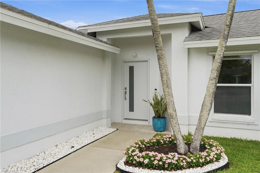 Photo of 750 Cherry Blossom CT, NAPLES, FL 34120 (MLS # 226011697)