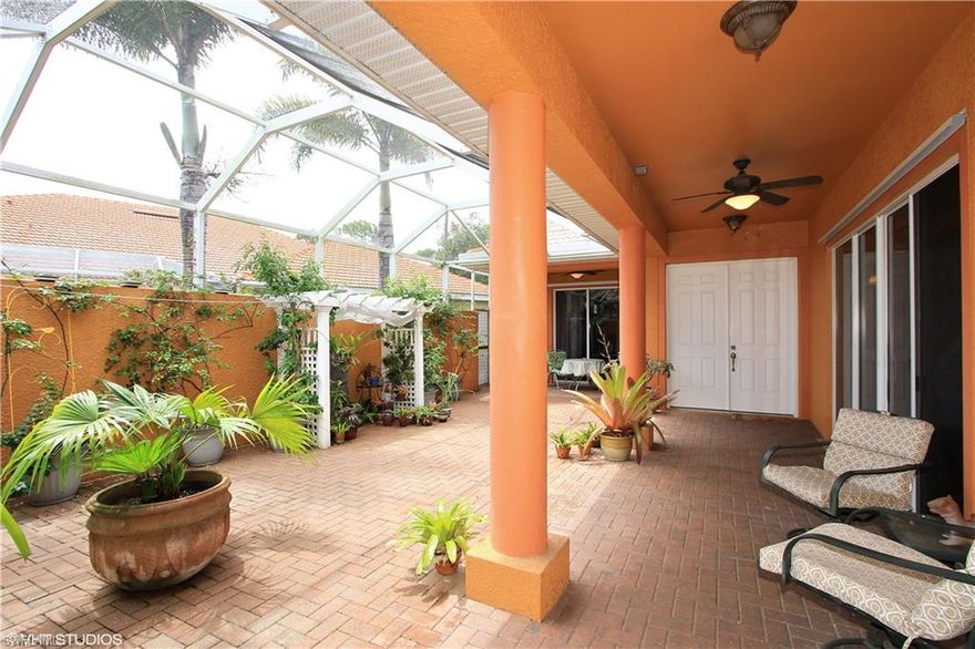 PRICE JUST REDUCED plus 2,000 buyer credit with acceptable offer!! This spacious courtyard home backs up to nearly 3 acres of protected wetland offering quiet tranquility in an upscale gated community. Unique design allows for first floor living with guest suites upstairs. This home is in fantastic condition with many upgrades including granite tops and diagonal tile floors. The screened courtyard offers privacy with bright sunshine and plenty of light for gardening and relaxing as well as a separate cabana with its own A/C. This could be an office, hobby room, bedroom or man cave--your choice! Courtyard is prewired for 220V so add a spa if desired. The 2nd floor has two large bedrooms each having its own full bath and walk-in closet. Wide kitchen with island opens up to plenty of space for casual dining and socializing. Rich colors, 42" tall overhead cabinets, tiled back splash, updated appliances and large pantry compliment your culinary experience. Archways, coffered ceilings and upgraded base moldings add to the elegance of this home. Bell Tower Park is centrally located and offers extensive amenities to enhance your lifestyle. Neighborhood pool is steps from your door!