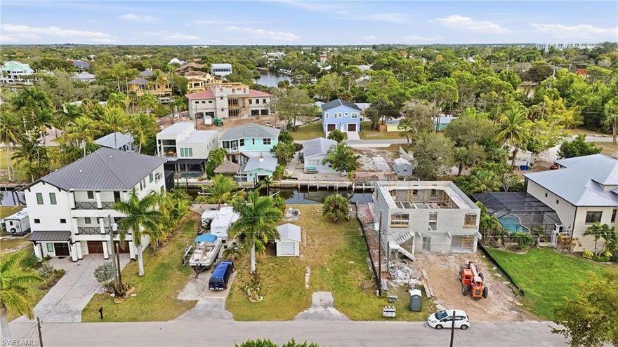 Prime location resting on a quiet culdesac street. Canal in rear with immediate access to Imperial River and Estero Bay, and just minutes from Bonita Beach and the Gulf. Build your own home. This is your perfect canvas to design and build. Enjoy sunshine all year long with this premiere piece of land waiting for you.