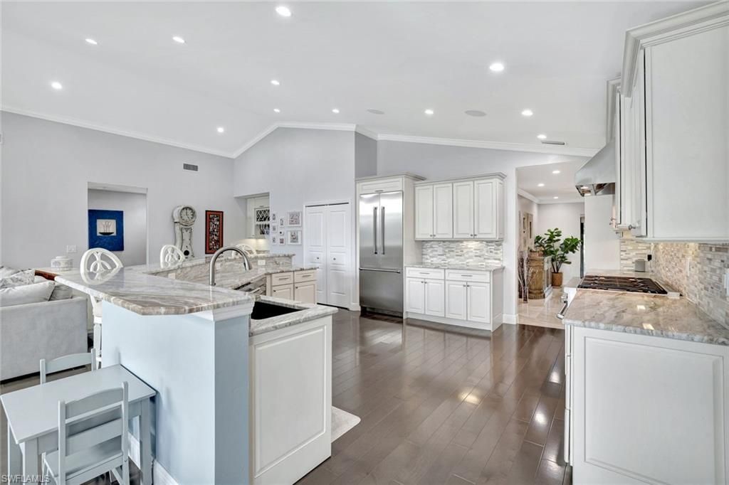 Photo of 36 Cajeput DR, NAPLES, FL 34108 (MLS # 225080578)