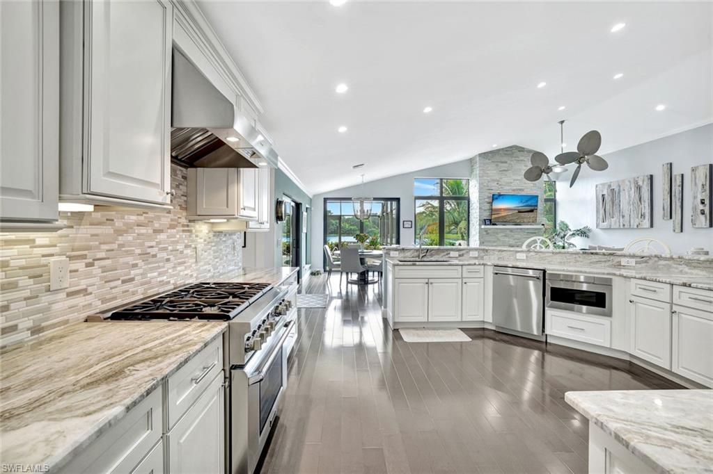 Photo of 36 Cajeput DR, NAPLES, FL 34108 (MLS # 225080578)