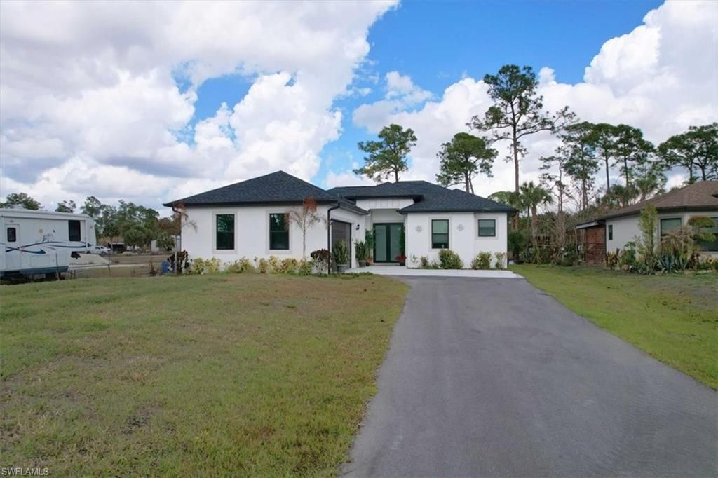 Photo of 2963 40th AVE SE, NAPLES, FL 34117 (MLS # 226009118)