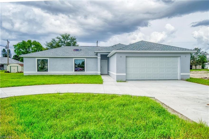 This new Construction will be completed in January 2022.  Most of it is complete and ready for viewing but the photos are for an exactly similar house that has been completed by the same builder. It is indeed a beautiful house that features 3 split bedrooms, 2 bathrooms, and a 2 car-garage. It is located in a quiet desirable neighborhood of Cape Coral close to Pine Island Road. This area has all the amenities that one needs for cozy living - restaurants, shopping, recreation and more. House features all wood floors.