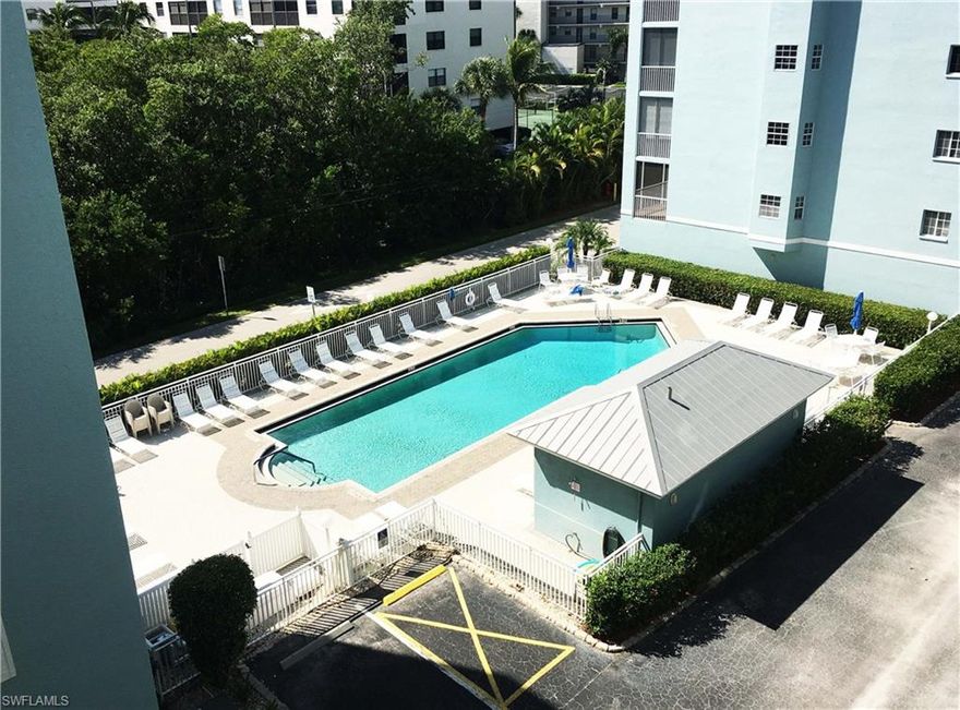 What a lovely TURNKEY, CORNER-UNIT condominium, with potential for a cute entryway, just a 5 minute walk to Pinchers' Seafood restaurant, the Windham Hotel tiki bar - and the largest beach on the island, with awesome daily sunsets during season.  A nice-sized 2-bed, 2- bath split-bedroom floorplan, the bedrooms can be used as dual master suites, as each bedroom has private access to the individual bathrooms.  Beautiful diagonally-cut tile,  with great light coming into the bay window as you have breakfast and lunch.  Seller-installed lanai glass sliders, and with the multi-track glass sliders pushed back, you've got another room. Guest bedroom and living room sofas double as queen-size pullout beds.  RENTAL INCOME:   Bi-Monthly rental frequency should appeal to renters who can't stay for a month.  Under-building parking, just 8 steps to the secure glass entry and elevator (nice).  And, a nice-sized under-building secure storage to boot.  Tennis?  Bocce?  Absolutely!  Turnkey minus sellers' personal effects, certain artwork, tools and material.  Bring your toothbrush.  You can get the rest here.