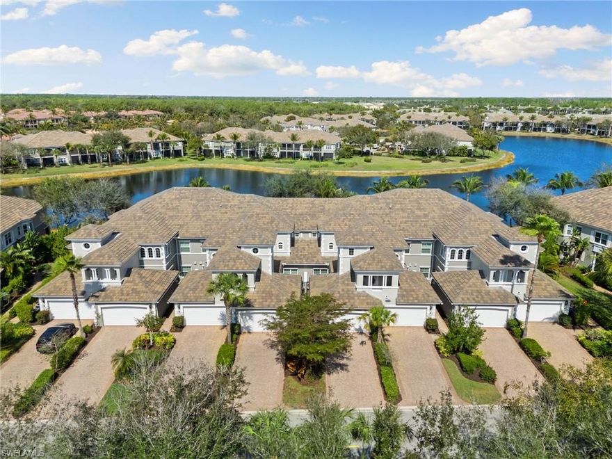 Enjoy stunning wide water views from this beautifully maintained and tastefully furnished 3 bed/3 bath coach home. The beautifully renovated kitchen features chic white cabinetry, white quartz countertops, and stainless steel appliances, creating a bright and modern space for everyday living and entertaining. The space has been further enhanced with the removal of the wall that once separated the great room from the family room, allowing light to pour into the kitchen and family room from the lanai. The wood-look luxury vinyl flooring flows throughout the home, adding warmth and durability. Additional recessed lighting and updated fixtures add a touch of sophistication. The spacious primary suite offers a comfortable retreat with walk-in closets and a well-appointed bathroom featuring dual vanities, a soaking tub, and a separate shower. From the great room or primary suite, step through the sliders and onto your expansive lanai which offers a peaceful setting to unwind while taking in the scenic long-water views. The spacious two garage also features an epoxied floor. The award-winning, resort style community of Fiddler's Creek is enhanced by a club and spa, fitness center, swimming pools, two golf courses, tennis courts, pickleball courts, a bocce court, fine and casual dining, social activities, and miles of biking and walking paths. Optional beach club and marina memberships are available. Experience the epitome of luxury living, where every detail is thoughtfully curated to complement your lifestyle.