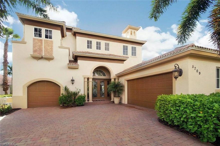 Custom Estate Home inside the gates of Cape Harbour, one of the area’s finest upscale gated waterfront communities. Oversized Home Site w/ Southeastern Rear Exposure, Wide Water Views, & a Composite Wrap-Around Dock w/ 2 Boat Lifts (20K & 5K lbs). Exquisite Architectural Style that is as warm & inviting as it is impressive. Floor Plan features 3 Bedroom Suites (2 Masters - 1 up/ 1 down), 3.5 Baths, Formal & Casual Living Spaces, a gorgeous Kitchen & Casual Dining Area, a 2nd Floor Loft/Den, Oversized Closets & Pantry, & a 2nd Floor Enclosed Screened Balcony. CALLING ALL CAR ENTHUSIASTS! 4-Car Garage! 8,000 lb. Lift in the single stall (stores 2 cars), plus a 2-car garage. Features include Custom Wood Cabinets, Granite Counters, Tile & Wood Flooring, Stained Wood Ceiling Details, Crown Molding, Impact Resistant Windows & Doors, Travertine Sills, 8’ Doors, Custom Built-ins w/ Fireplace, Morning Kitchen/Wet Bar, Custom Window Coverings, New A/C's 2020, & so much more! Large Covered Lanai with Mahogany Ceilings, Armor Shield Roll-down Screens, an Outdoor Kitchen, a beautiful Swimming Pool w/ Raised Spillover Spa, Paver Decking, & a Mansard Screen Enclosure. Most Furnishings Negotiable.