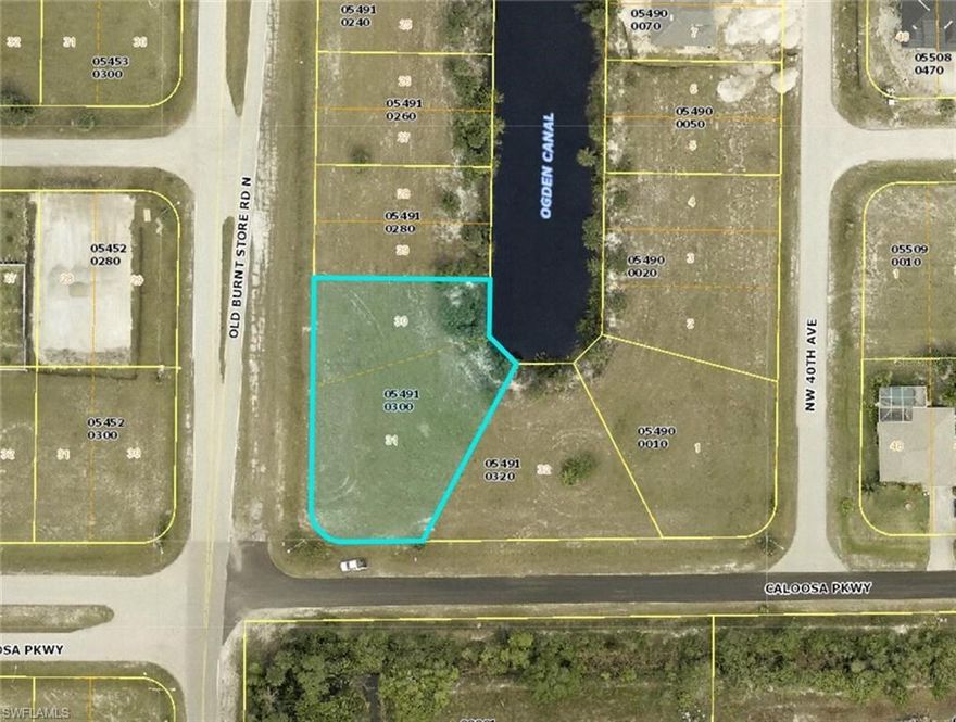 Enjoy the serene views of the Freshwater Ogden Canal from this rare half-acre lot! This unique waterfront property offers a total wrapping around the end of the canal, providing a tranquil and peaceful atmosphere. Imagine building your dream home  and direct access to the canal, perfect for boating, fishing, or simply enjoying the sunset.