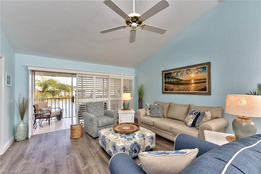 Wow!  Come see this jewel of a home in Emerald of Sapphire Lakes!  This sunny & bright 2nd floor condo looks directly into a gorgeous lake & sparkling fountain.  Condo includes 2 bedrooms, 2 full bathrooms, with a great room floor plan, cathedral ceilings, plantation shutters & comes with it's very own detached one car garage.  This meticulously maintained home has been freshly painted & has easy to clean, new luxury vinyl flooring & 5 1/4 colonial style baseboard throughout.  New stove, refrigerator, microwave & dishwasher in 2017.  New dryer 2020 & hot water heater in 2019.  Home includes a large laundry room.  Sapphire Lakes is a fun, friendly, active & welcoming community!  Amenities in Sapphire Lakes include: 4 pools, bocce courts, shuffleboard, tennis courts, pickleball, a walking path, picnic area with grills, horse shoes & a basketball hoop.  Great location!  Close to great shopping & dining!  Minutes from Downtown 5th Ave, Cambier Park, Tin City, Bayfront, Baker Park, the Gordon River Greenway, the Naples Botanical Garden, the Naples Zoo, the Naples Philharmonic, the Naples Airport, NCH hospitals, the Naples Pier & the beautiful white sandy beaches of Naples!