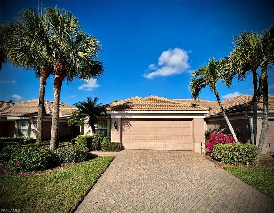 Have you been looking for the perfect place to escape the cold with family and friends?  Then look no further... This beautiful and impeccably maintained TURNKEY bundled golf villa will check all the boxes.  Starting outside- THAT VIEW!!!  Enjoy sunsets overlooking the sparkling waters and distant verdant fairways on your oversized lanai with concrete paver bricks and an upgraded picture frame styled panel. Plenty of seating and lounging options for everyone. Your home will be everyone's favorite place to wind down with a favorite beverage after a long day on the golf course or on the tennis or pickleball courts.
Inside will continue to impress with an open floor plan with vaulted ceilings, upgraded lighting and flooring but most of all- that kitchen!  A remodel added beautiful white cabinetry with slow close doors and drawers and some of the prettiest granite to grace the counters, breakfast bar and backsplash you'll ever see. Also include newer stainless appliances, a large pantry and recessed lighting and you have a true chef's delight!
The triple telescoping sliding glass door off of the living room allows for true indoor/outdoor living and al fresco dining so that you can enjoy the picturesque sunsets and the tropical breezes that make SWFL world famous!
The Primary Bedroom Suite serves as a private oasis featuring a triple window overlooking that same magnificent view and an en suite bathroom remodeled with a custom tiled oversized shower, dual vanity, large linen closet, and integrated walk in closet.
Guests will enjoy their own separate en suite space with a large closet of their own. The den provides a flex space for extra guests, home office, a studio-you decide!
With nearly 1,700 sf of living space and a large 2 car garage-you can park your vehicle or maybe a golf cart?  Also important to note is that the Villa includes a electric motorized screens for storm protection on the lanai, and accordion style window protection throughout the home so you can feel assured with any impending storm.
Colonial Country Club is conveniently located just off I-75 close to SWFL'S amazing restaurants, shopping and beaches. Residents and their guests are offered the finest amenities including: FULL GOLF MEMBERSHIP INCLUDED at this bundled golf club. Gordon Lewis designed this Troon Golf Course in this Professionally Managed Golf Community. As a bonus for members, Membership allows play at other Troon golf facilities throughout the globe. Additionally numerous well maintained and lit clay tennis courts; pickle ball courts and two bocce courts- are offered-all with leagues galore. Stay in top shape at the state of the art fitness center with full slate of fitness and aqua fitness offerings; a beautifully remodeled Clubhouse with full restaurant and bar with many special events with entertainment; a library; several sparkling community pools; miles of winding streets with sidewalks and even a large wooded wildlife preserve within the gates.