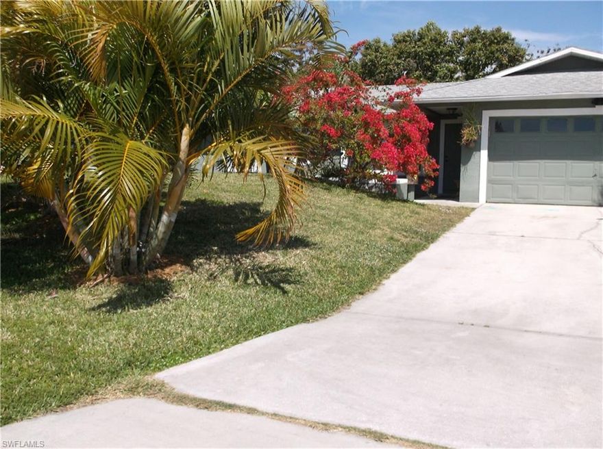 Beautifully landscaped SW home.  It boast vaulted ceilings, split floor plan, brand new kitchen with quartz counters and tons of kitchen storage and counter space. Dark wood look tile throughout.  Newer AC and hot water heater.  The bathrooms need some work, but functional.  Custom closets in 2 of the rooms.   2 car garage which half was turned into a small room for storage.  Snap shed in the fenced in back yard.  The yard contains so many fruit trees I can't list them all here, not to mention the raised flower beds.  It is a must see if you want a fixer upper that's half way there.