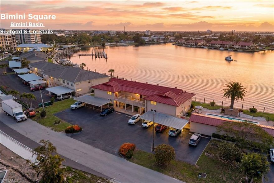 Direct Gulf access. 2nd floor end corner unit. Wide Bimini Basin views with nonstop boating activity. Steps from Bimini Square. Steps from the pool.

This fully renovated condo puts you right on the water with panoramic sunrise views and a front-row seat to boats cruising in and out of the basin all day. From morning coffee to evening wind-down, there is always something to watch and enjoy, just steps from the Bimini Basin.

Inside, everything has been updated in a clean coastal style. New flooring, cabinetry, countertops, backsplashes, and appliances. The kitchen has been fully renovated, and the bathrooms feature nicely updated tile. There is also in-unit laundry for everyday convenience.

As an end unit, natural light pours in and the water views are even more open and expansive.

Step outside and you are immediately connected to the boating lifestyle with direct Gulf access and community docks that were just redone, making it easy to get out on the water whenever you want.

The lanai features a wet bar with sink as part of the renovation, perfect for entertaining or relaxing while watching the boats pass by.

The location is what truly separates this property. Bimini Square is literally right outside your front door. Walk to dining, healthcare, and everyday conveniences, including the newly opened Bimini Basin Seafood & Cocktails just across the way. Downtown South Cape is only a 10 to 15 minute walk for even more restaurants, bars, and shops.

This offers the Bimini Square lifestyle at a fraction of the cost, plus the added value of direct Gulf access and true waterfront living. You will even have a front-row seat to Cape Coral’s Christmas boat parade right from your own home.

Furniture is available separately for a turnkey opportunity.