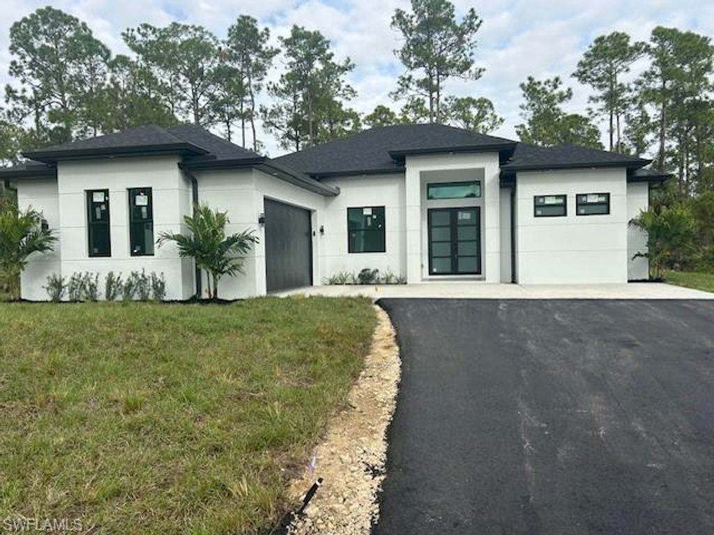 Photo of 3307 12th AVE NE, NAPLES, FL 34120 (MLS # 226010654)