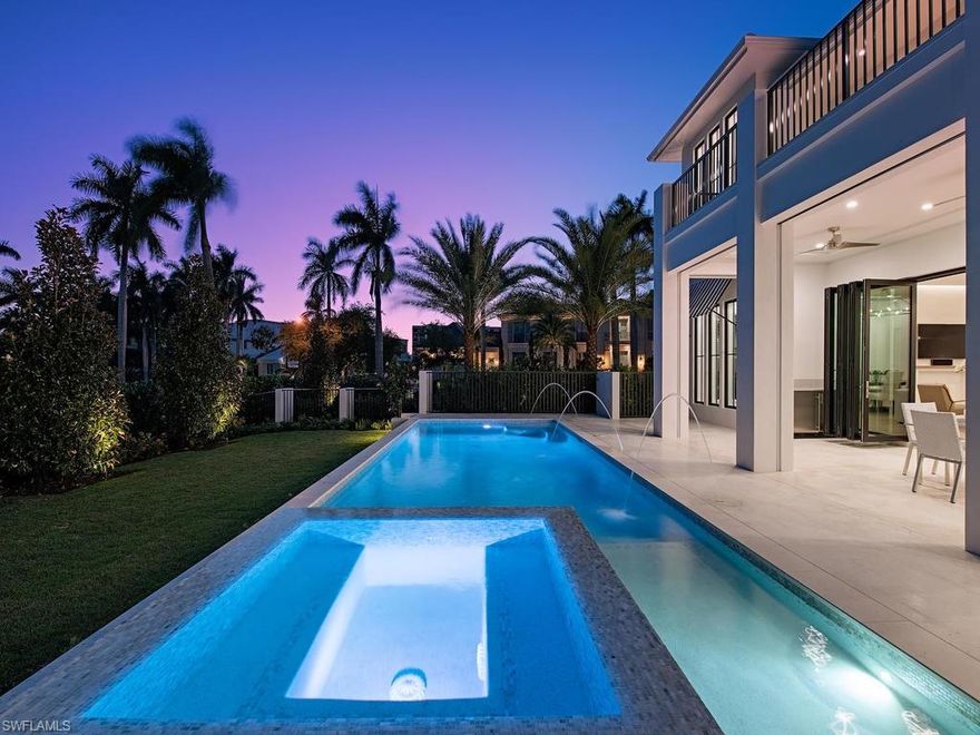 Beautiful new custom home in The Moorings with southern exposure on pool! Very spacious great-room plan with floor to ceiling Grabill Cabinetry in Kitchen and Service Kitchen. Master Wing includes: large master bathroom with two water closets, two master closets, and sitting area bedroom. Enjoy the outdoor living with over-sized pool deck that has sun all day, gas heated pool and spa, gas fireplace, outdoor BBQ grill and under-counter refrigerator and ice maker, electric screens & shutters and pool bath. Upgrades Include: Residential Elevator, Legno Bastone herringbone wood floor with border in Main Living Room, Foyer, Kitchen, Grabill Custom Cabinets, Sub-zero Integrated Refrigerator/Freezer and 48" Wolf Gas Cooktop, Sub-zero refrigerator drawers, stand-a-lone ice maker. Service Kitchen includes: Wolf Steam Oven, wall oven, warming drawer.  Custom ceiling beam work, security system, central vac system, camera system, Cinema ceiling speakers and pre-wire for surround sound in great room, and control 4 lighting system in main living area and master suite.  Private Mooring Beach available!