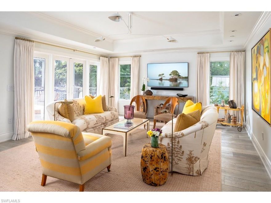 Enjoy all of the finest attributes of Old Naples! A serene and private setting located less than one block from the excitement of the 3rd Street South shopping and dining district and just over three blocks to the beaches of Old Naples! This condominium exudes understated elegance, celebrating simplicity with grace. The spacial relationships and flow of the rooms within create a welcoming positive energy. An open entry area, sizable living room, beautiful kitchen and adjacent family room provide excellent spaces for entertaining family and guests. Three bedrooms and
an office, offer magnificent space for rest and productivity. A charming screened balcony overlooks the pool area and lush greenery. Private elevator and two car garage. A rare and exciting offering in a low density, three unit building!