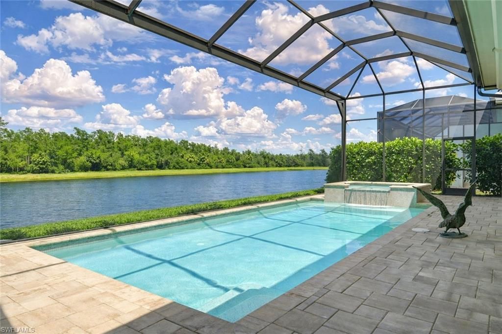 Photo of 14338 Laguna Springs LN, NAPLES, FL 34114 (MLS # 226019844)