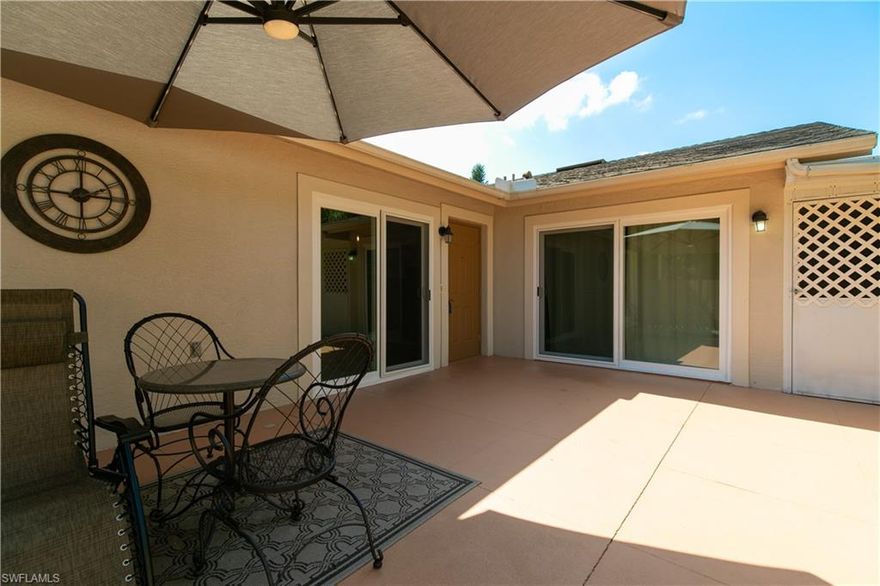 Beautifully maintained unit in a beautiful private setting!  The Palm Lakes subdivision of Foxmoor is the ONLY sub-division constructed with concrete block and stucco. No wood here. Unit 103 is tucked away in the back offering a very private & peaceful setting.  Enter the home through a large fenced patio-perfect for pets and humans! The interior was updated in 2020 to include a new A/C, water heater, paint, CPVC plumbing, new plumbing & lighting fixtures, & fresh interior paint.  The kitchen boasts a beautiful tongue & groove accent wall and ceiling. The flooring was updated to tasteful wood like laminate flowing throughout the home. The bathrooms were also updated.  2021 additions include two new hurricane impact resistant sliders (8/2021).  Sizable outside storage room too just off of the patio. The monthly HOA for Palm Lakes covers, the roof, the fence, exterior paint and the flood insurance! The community offers three pools, bocce & tennis courts & a dock w/Gulf Access (cost for boat dock space is lease). Well maintained unit in a well maintained community near major roads but tucked away.  Definitely worthy of your time!!