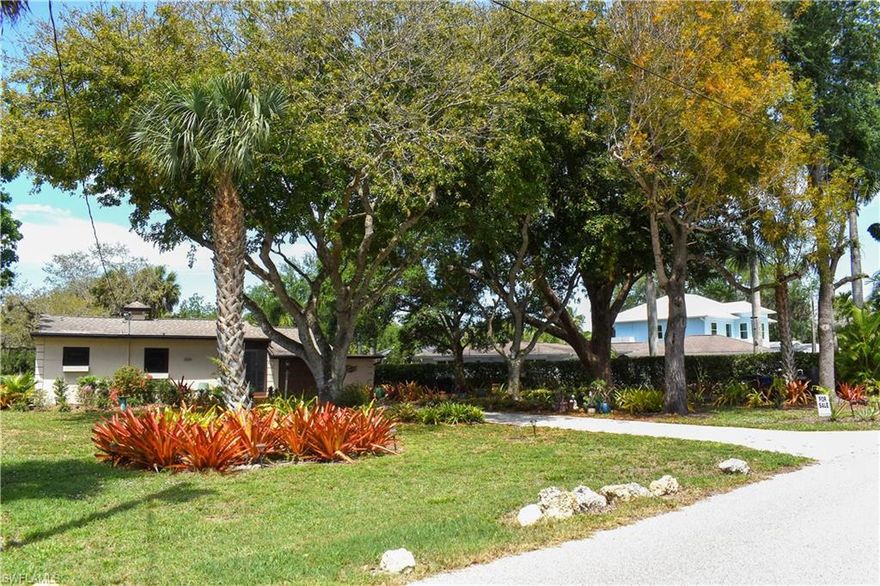 Charming river cottage-style home nestled in a lush, beautifully landscaped setting, offering a peaceful retreat right on the water. Surrounded by mature trees, tropical plantings, and vibrant greenery, this property exudes warmth and character from every angle. Enjoy tranquil water views and serene outdoor living, all while being just minutes from the vibrant downtown Bonita entertainment district, where dining, shopping, and nightlife await. A perfect blend of natural beauty, privacy, and convenient location, this home captures the essence of Southwest Florida living. Oak creek is a first order tributary to the Imperial river which flows through Estero Bay to the Gulf of Mexico