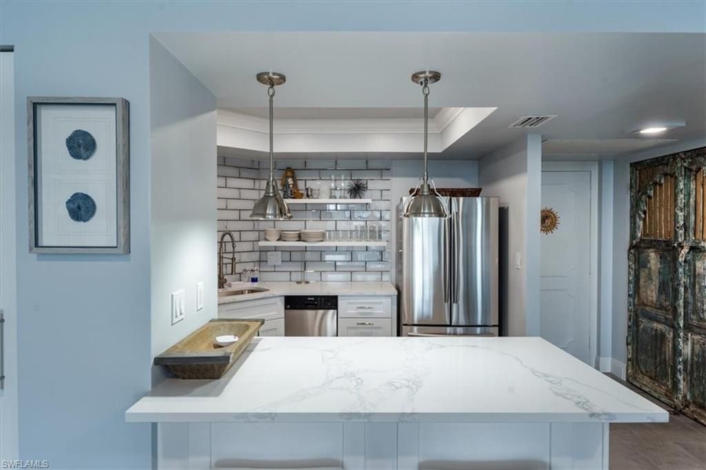 Photo of 3 Bluebill AVE #512, NAPLES, FL 34108 (MLS # 224004750)