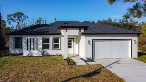 Photo of 422 Eisenhower BLVD, LEHIGH ACRES, FL 33974 (MLS # 226017978)