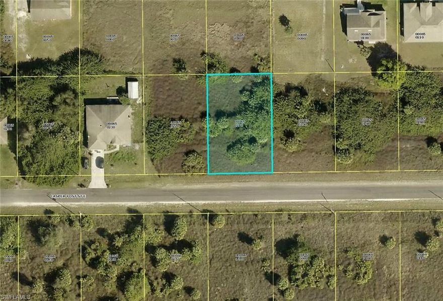 QUARTER-ACRE RESIDENTIAL LOT located in desirable neighborhood off Bell Blvd. in southeast Lehigh Acres.  Easy access to State Rte. 82 which has recently undergone major expansion to facilitate travel into Fort Myers, and all that southwest Florida has to offer.    Reserve your piece of paradise in the Sunshine State while prices are still affordable.  Call today for more information!