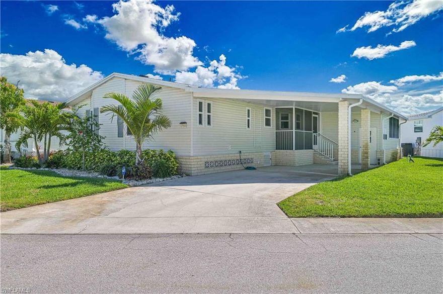 Welcome to this exceptional Gulf-access corner lot in the highly sought-after boating community of Bayside Estates. This beautifully remodeled newer manufactured home blends modern coastal finishes with an open-concept design. Offering 3 bedrooms and 2 baths, the home is thoughtfully designed for comfort, functionality, and water-inspired living. Interior upgrades include luxury vinyl flooring throughout, a stunning new kitchen with an oversized granite island, vaulted ceilings, and tastefully updated bathrooms — creating the perfect space for everyday living and entertaining.

The bright, open kitchen flows seamlessly into the main living area and spacious Florida room, providing multiple flexible spaces for relaxing, dining, or hosting guests. The large primary suite offers a peaceful retreat, while the interior laundry room adds convenience. Recent major improvements include hurricane impact windows (2018), a new roof (2023), and a new AC system (2025) for added peace of mind.

Step outside and enjoy true waterfront living just steps to your dock and boat lift, allowing for quick access to the Gulf. The oversized corner lot enhances privacy, outdoor space, and curb appeal.

Bayside Estates is a vibrant and active 55+ waterfront community located just minutes from Fort Myers Beach. Residents enjoy resort-style amenities including pickleball, bocce, shuffleboard, a community pool, boating opportunities, and a dynamic social calendar filled with events and activities. Whether you are searching for a seasonal retreat or a full-time coastal home, this property offers the perfect opportunity to live the Florida boating lifestyle. No flooding during Helene or Milton.