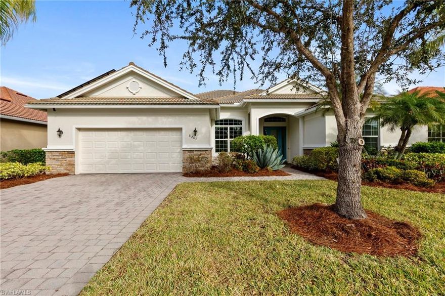 Discover this impeccably maintained 3 bedroom plus den open concept home in the sought-after Madison Park community of Naples, Florida, where serene lake views create a peaceful backdrop for everyday living. This thoughtfully designed residence features a desirable split-bedroom layout with a spacious living and family room, a flexible den perfect for an office or hobby space, a 2022 updated HVAC system, and hurricane-impact windows for enhanced security and comfort. Step through the elegant glass door entry with its transom window into a bright, open interior accented by diagonal tile flooring, soaring volume and tray ceilings, recessed lighting, graceful arched walkways, and ceiling fans throughout. The home flows seamlessly to expansive outdoor living areas, including a covered lanai that overlooks a sparkling solar-heated pool, spa, and tranquil lake views. The gourmet kitchen is a standout, boasting hard wood cabinetry, sleek quartz countertops, a striking mosaic tile backsplash behind the range, premium upgraded appliances—including an induction cooktop, microwave, and state-of-the-art Samsung Bespoke smart refrigerator—and a cozy eat-in dining nook framed by large windows capturing the pool and water vistas. The spacious living room extends effortlessly outdoors through sliding doors to the lanai, making it ideal for relaxed daily living or effortless entertaining. Retreat to the luxurious owner’s suite, a private oasis with beautiful wood flooring, white Hunter Douglas blinds, direct lanai access, generous walk-in closets, and a spa-like en-suite bath complete with dual granite vanities (including a makeup vanity), a full-width mirror, a walk-in shower, a separate jetted soaking tub, and a privacy window that fills the space with natural light. Two versatile guest bedrooms, both finished with modern wood flooring, share a well-appointed bath featuring a tub-shower combination. Outdoor enjoyment reaches new heights with the expansive covered lanai equipped with a ceiling fan, fully screened enclosure, solar-heated pool and flow over spa with stunning lake views. Electric storm shutters provide added convenience and protection. As a bonus, the home includes a complete solar panel system paired with a 30kW backup battery, resulting in an impressively low monthly FPL cost of just $25.66. Nestled in the welcoming Madison Park community—known for its scenic lakes, abundant natural preserves, fishing opportunities, and birdwatching—residents enjoy low HOA fees that cover lawn and landscape maintenance, irrigation, and high-speed internet. The prime location offers easy access to shopping, dining, vibrant downtown Fifth Avenue South, Marco Island, and Naples’ world-famous beaches. Experience the perfect blend of luxury, convenience, and Florida lifestyle in this move-in-ready gem.