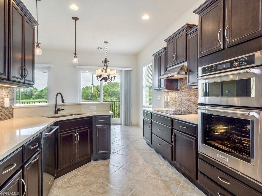 Look no further! You've found the Glastonbury Coach Home Trifecta: Impact Rated, Gourmet Kitchen and Premium Lake and Golf Course Views. Built in 2016, this Second-Floor Carriage Home with 3 Bedrooms + Den, 2.5 Baths and 2-Car Garage is in Like-New Condition. Windows and Doors are IMPACT RATED so you'll never worry about shutters again. Kitchen with Quartz Countertops, Mosaic Glass Tile Backsplash and Solid Wood Cabinets with 42" Uppers, Detail Moulding and Under-Lighting. KitchenAid Stainless Steel Appliances with Sleek Cooktop, Direct Vent Hood and Double Wall Oven / Convection Microwave. Additional features include: Brushed Nickel Hardware Throughout, Designer Light Fixtures, Diagonally Laid Floor Tile, 8-Foot Doors, Multiple Trey Ceilings and Baths with Solid Wood Cabinets and Level 3 Granite. The Plantation is a highly sought-after gated community along master planned Treeline Corridor with convenient access to RSW Airport, I-75, Gulf Coast Town Center and JetBlue Park. Boasting a 38,000 square foot clubhouse with resort and lap pools, tennis courts, bocce ball, fitness center, and an activity director. Golf membership is OPTIONAL. Schedule your private showing today!