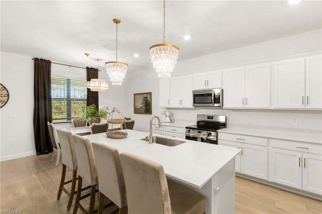 Photo of 14331 Winding Cedar WAY, FORT MYERS, FL 33913 (MLS # 226026321)