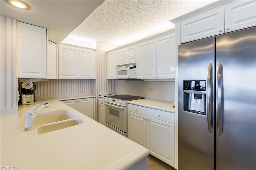 SANDCASTLE AT MARCO BEACH - Residential