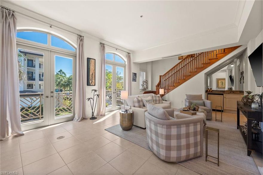 An exceptional offering in the heart of Naples’ vibrant Design District, this impeccably curated turnkey residence embodies the sophistication and ease of true downtown luxury living. Located within the exclusive Modena—an intimate boutique building of only four private residences—this expansive 2,352-square-foot condominium presents refined interiors, elevated design, and effortless walkability to the city’s most coveted destinations.

Meticulously maintained and enhanced with approximately $50,000 in designer lighting, furnishings, and thoughtful upgrades, the residence is offered turnkey furnished with select exclusions, creating an immediate move-in-ready opportunity or an ideal executive retreat. The flexible leasing policy allowing up to 12 rentals per year with 30-day minimums, combined with pet-friendly accommodations for small dogs, makes this a compelling investment or corporate residence in one of Naples’ most desirable urban settings.

Inside, soaring ceilings and an abundance of French doors and windows bathe the interiors in natural light, while elegant architectural detailing and carefully selected finishes create a timeless yet contemporary aesthetic. The thoughtfully designed floor plan features two expansive bedroom suites, each with private ensuite baths and generous walk-in closets, along with a versatile den complemented by its own full bath—easily serving as a third bedroom, private office, or media retreat.

The residence captures charming city views while maintaining an atmosphere of privacy and exclusivity rarely found in downtown living. A detached private garage provides secure parking for a vehicle or golf cart, while additional dedicated storage offers convenience for bicycles and beach essentials.

Perfectly positioned just moments from Naples’ most celebrated destinations—including Baker Park, Wynn’s Market, Badass Coffee, Mister 01 Pizza, The Claw Bar, The Warren, and the world-class shopping and dining of Fifth Avenue South—this residence offers an unparalleled lifestyle defined by walkability, culture, and convenience. The unit is ideally situated within walking distance of the highly anticipated Avenue development, an upcoming destination featuring upscale retail boutiques and a curated selection of premier dining experiences.

A rare turnkey opportunity combining boutique exclusivity, investment flexibility, and refined design, this exceptional Modena residence represents downtown Naples living at its finest.