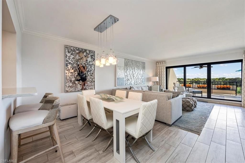 Photo of 6300 Pelican Bay BLVD #404A, NAPLES, FL 34108 (MLS # 225075720)