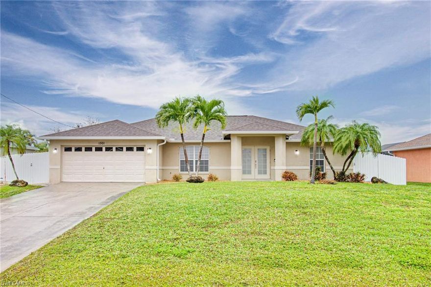 Stunning pool home in the heart of Cape Coral! This beautifully maintained 3-residence offers the perfect blend of comfort, style, and Florida outdoor living.

Step inside to an open-concept layout featuring soaring 12-foot ceilings and a spacious great room filled with natural light. The kitchen is designed for both everyday living and entertaining, complete with stainless steel appliances, a center island, and ample cabinetry.

The split floor plan provides privacy, with a generous primary suite showcasing a spa-inspired bathroom with dual vanities, soaking tub, and a separate walk-in shower. 

The true highlight of this home is the screened-in pool area—perfect for relaxing or entertaining year-round. Enjoy your private lanai with plenty of covered seating space, overlooking a beautifully paved pool deck and a fully fenced backyard for added privacy.

Additional features include tile flooring throughout main areas, indoor laundry, a new roof (2019), and A/C replaced in 2016.

Move-in ready and located in a desirable neighborhood close to shopping, dining, and major roadways—this is Florida living at its best!