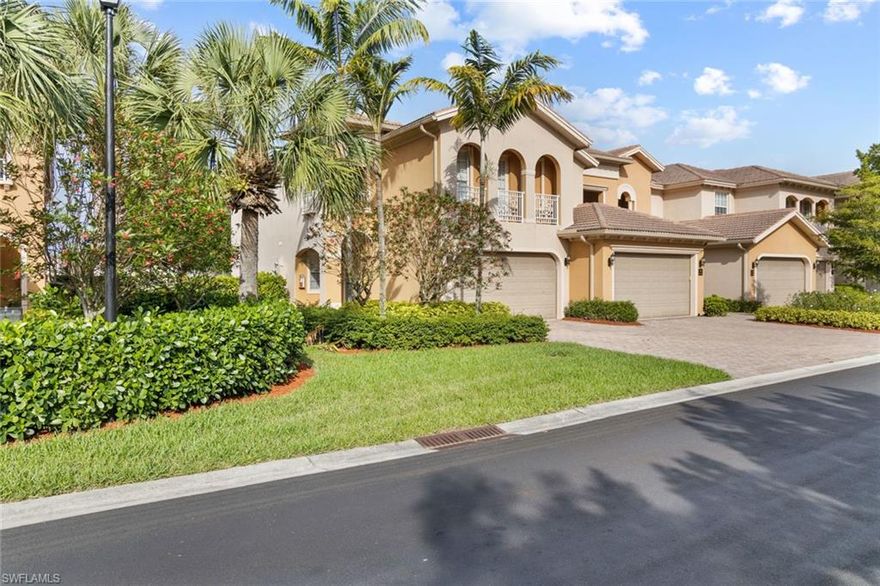 LOCATION, LOCATION, LOCATION...end corner unit w/ a tranquil long view of the lake.  First floor coach home lives so large, est. 2011 sq. ft. per the builder's brochure.  Huge screen lanai (est. 11 x 24) 2-car attached garage, expansive great room floorplan w/ 3 bedrooms, 2 1/2 baths.  A/C less than 18 months old w/ higher efficiency inside & out.  Features include: 18" ceramic tile on the angle, carpet in the bedrooms, refrigerator only 2 years old, GE appliances, granite countertops & maple cabinets in the kitchen, tray ceilings, over-size closets.  The master suite features sliders to the lanai, a large walk-in closet & spacious master bath.  The Meadows of Estero boasts a gated entrance, clubhouse, pool, hot tub, fitness center, billiard room, on-site mgmt., lavish landscaping, weekly community events, i.e. yoga, water aerobics, game night & more...  Close to fine dining, shopping, the airport & 15 minutes to the beautiful beaches of SWFL.