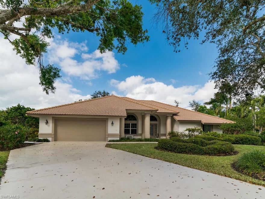 This spacious updated family home enjoys a private cul-de-sac location. Enjoy a secure gated Community. Newer tile roof, air conditioning system, hot water tank and all appliances.Community activity center includes tennis, pool and clubhouse and is located just minutes to the Gulf of Mexico beaches.
