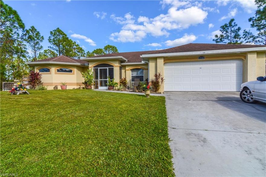 If you love to be outdoors, this is the home for you!  It features a privacy fenced, one-half acre lot that surrounds a yard filled with little seating areas for great conversation when guests come to visit.  There is an fabulous screened pool and lanai area for hanging out in the sun or relaxing after work.  And I haven't even begun to describe the remarkable home attached to this pool and lanai. The double front doors to the open concept living, kitchen and dining area, plus a den.  The living/great room has bypass sliding doors that allow open access to the lanai and pool area.  A wonderful, open kitchen awaits the cook in you.  Beautiful white cabinets with great architectural detail offer plenty of storage. The laundry room is located between the kitchen and garage. There are two nicely sized bedrooms and a full bath with access to the pool area in this wing of the home, also. On the opposite side of the home, is the gorgeous and large master suite with sliding doors to the lanai. A remarkable master bath will take your breath away.  His and her sinks, a soaking tub in the center of the room, an unbelievable shower, a water closet and did I mention, his and her closets!